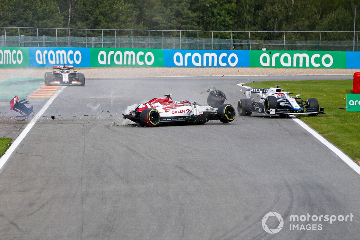 Antonio Giovinazzi, Alfa Romeo Racing C39 collides with the barrier and his loose tyre hits the car of George Russell, Williams FW43