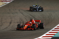 Sebastian Vettel, Ferrari SF71H, leads Valtteri Bottas, Mercedes AMG F1 W09