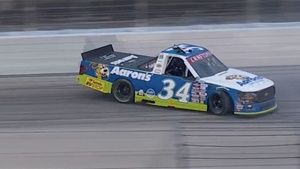 Layne Riggs spins after contact with Majeski