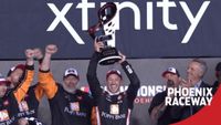 Daniel Hemric is presented the 2021 Xfinity Series championship trophy