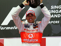 Hamilton takes Singapore as competition falters Hamilton takes Singapore as competition falters