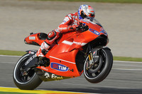 Stoner storms to emotional pole in Valencia Stoner storms to emotional pole in Valencia