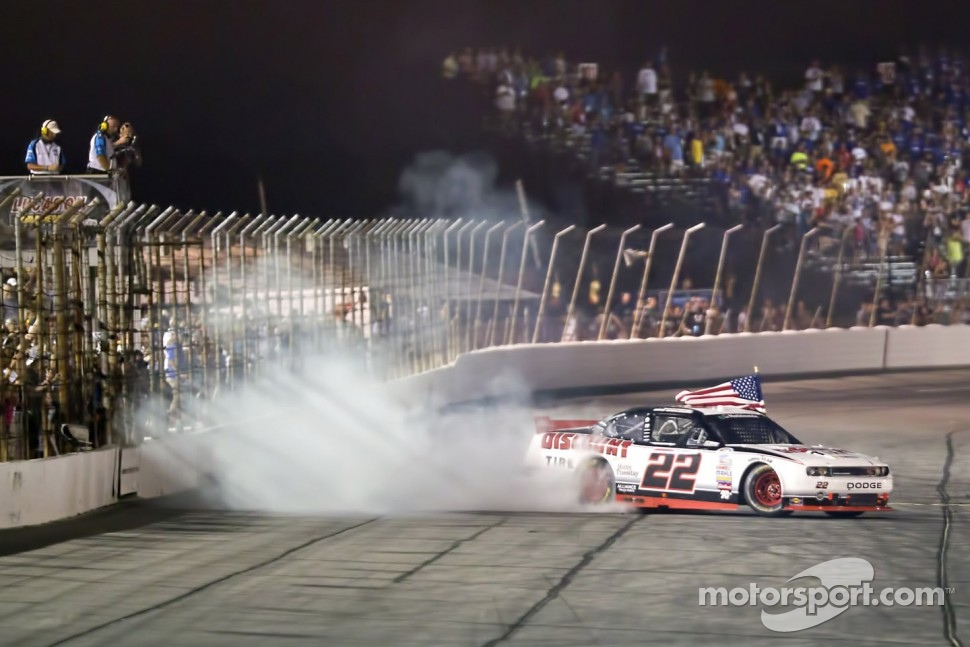 Race winner Brad Keselowski celebrates