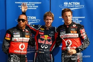 Pole winner Sebastian Vettel, Red Bull Racing, second place Lewis Hamilton, McLaren Mercedes, third place Jenson Button, McLaren Mercedes