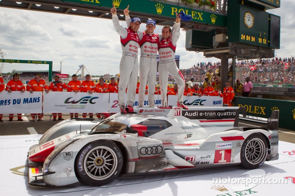 Race winners Marcel Fässler, Andre Lotterer and Benoit Tréluyer celebrate