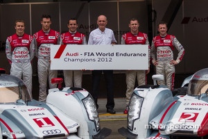 Audi drivers pose with Dr. Wolfgang Ullrich celebrating their overall FIA WEC Championship win. Drivers from left to right: Marcel Fässler, Andre Lotterer, Benoit Tréluyer, Tom Kristensen, Allan McNish