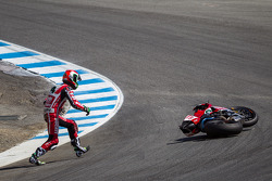 Davide Giugliano retrieving his bike