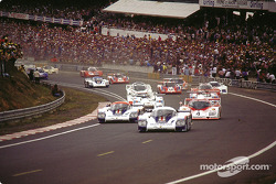Start: #1 Rothmans Porsche Porsche 956: Jacky Ickx, Derek Bell takes the lead in front of #2 Rothmans Porsche Porsche 956: Jochen Mass, Vern Schuppan
