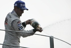 Podium: champagne for Juan Pablo Montoya