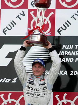 Podium: race winner Kimi Raikkonen