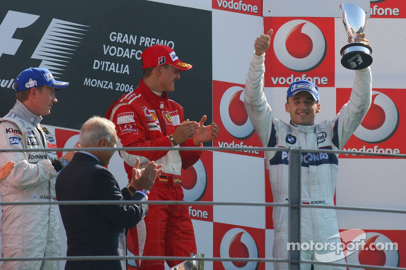 Podium: race winner Michael Schumacher with Kimi Raikkonen and Robert Kubica