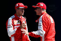 Secondo posto Kimi Raikkonen, Ferrari e terzo posto Sebastian Vettel, Ferrari