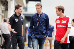 Romain Grosjean, Lotus F1 Team, mit Alex Wurz, Williams, und Sebastian Vettel, Ferrari