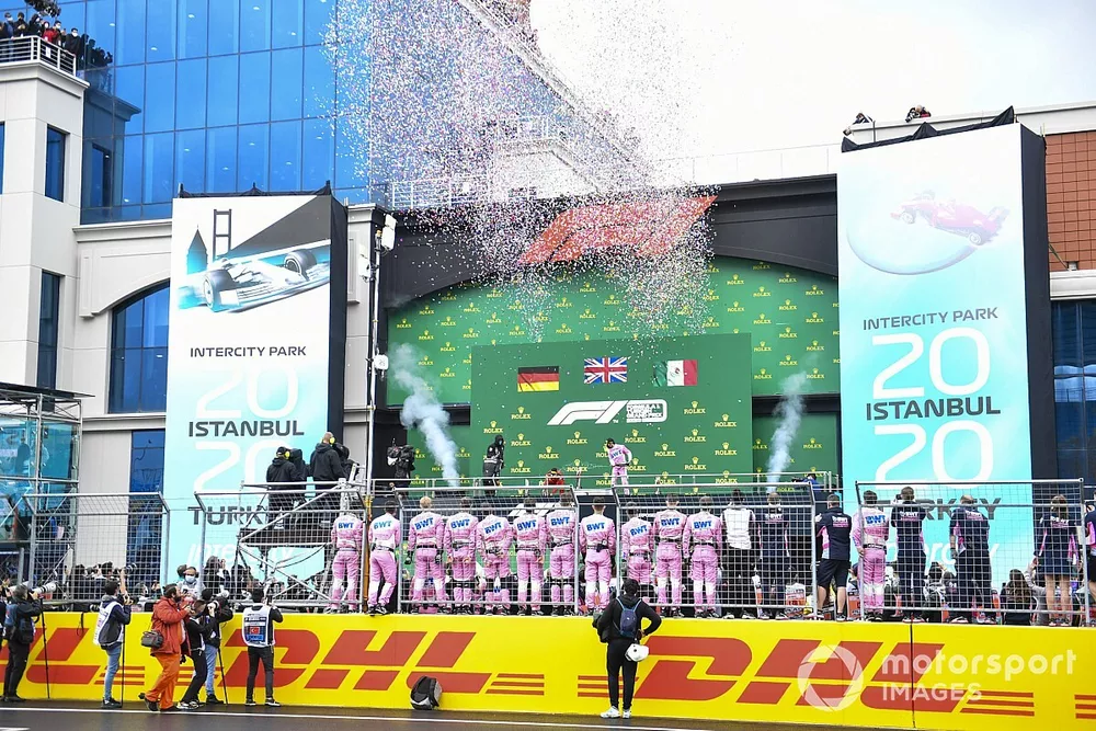 Lewis Hamilton, Mercedes-AMG F1, 1st position, Sebastian Vettel, Ferrari, 3rd position, and Sergio Perez, Racing Point, 2nd position, celebrate on the podium