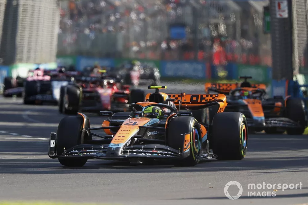 Lando Norris, McLaren MCL60, leads Oscar Piastri, McLaren MCL60, and Carlos Sainz, Ferrari SF-23