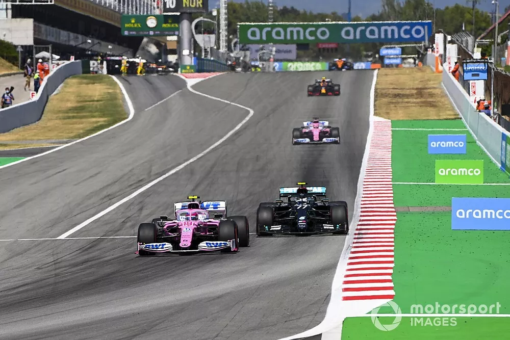 Lance Stroll, Racing Point RP20, leads Valtteri Bottas, Mercedes F1 W11 EQ Performance, and Sergio Perez, Racing Point RP20