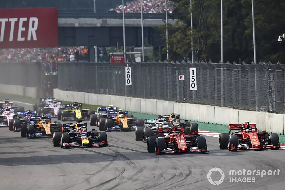 Charles Leclerc, Ferrari SF90 leads Sebastian Vettel, Ferrari SF90 and mMax Verstappen, Red Bull Racing RB15 at the start of the race