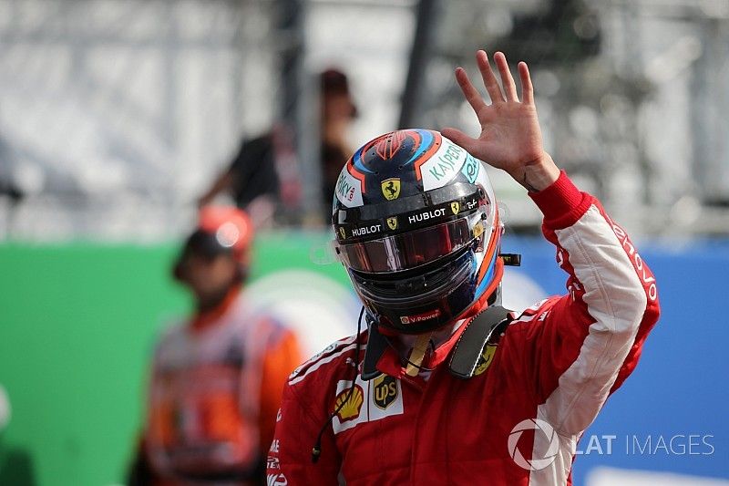 Pole sitter Kimi Raikkonen, Ferrari celebrates in parc ferme 