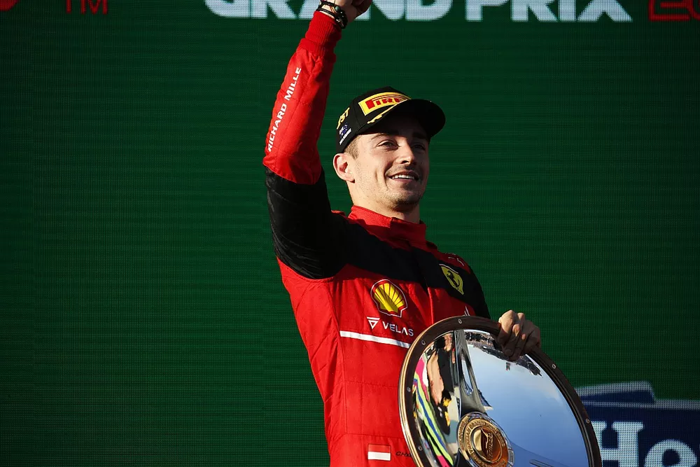 Charles Leclerc, Ferrari, 1st position, with his trophy