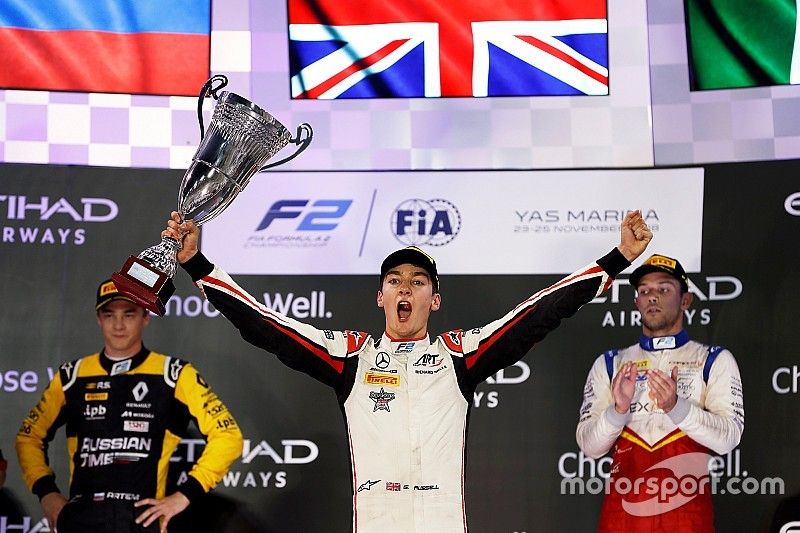 George Russell, ART Grand Prix celebrates on the podium with Artem Markelov, RUSSIAN TIME, and Luca Ghiotto, Campos Racing