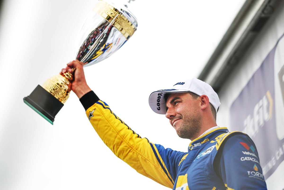 Cammish survives downpour and gravel trip for victory