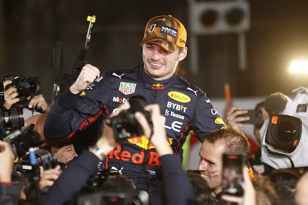 Max Verstappen, Red Bull Racing, 1st position, celebrates World Championship victory with his team