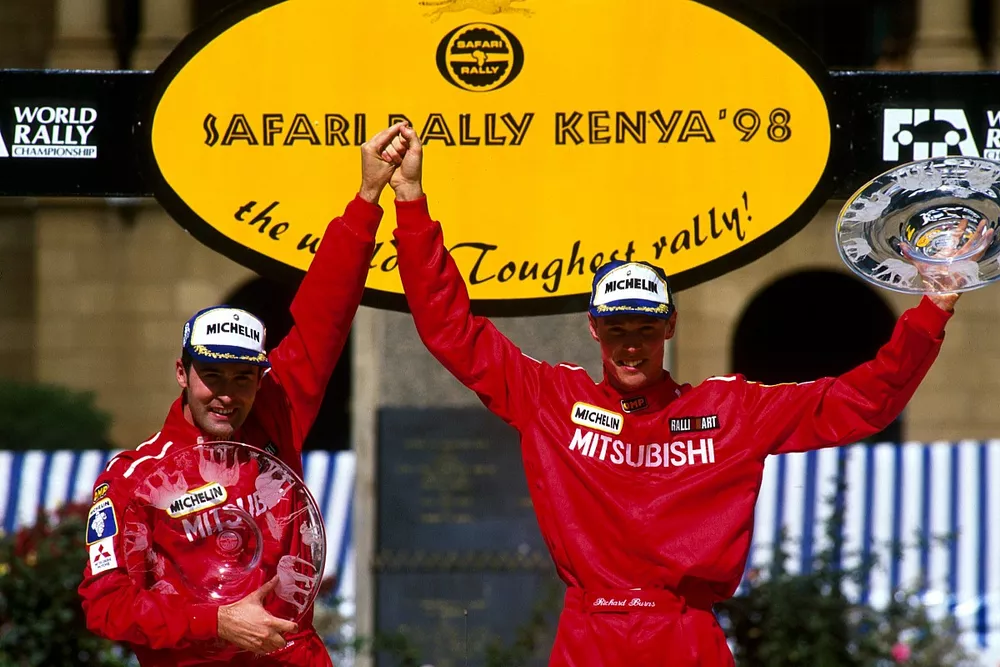 Co-driver Robert Reid and driver Richard Burns,  Mitsubishi took their first win