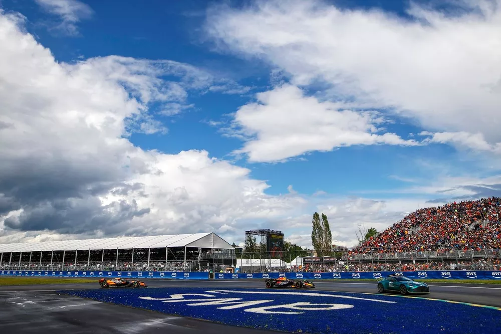The Aston Martin Vantage Safety Car Max Verstappen, Red Bull Racing RB20 and Lando Norris, McLaren MCL38 