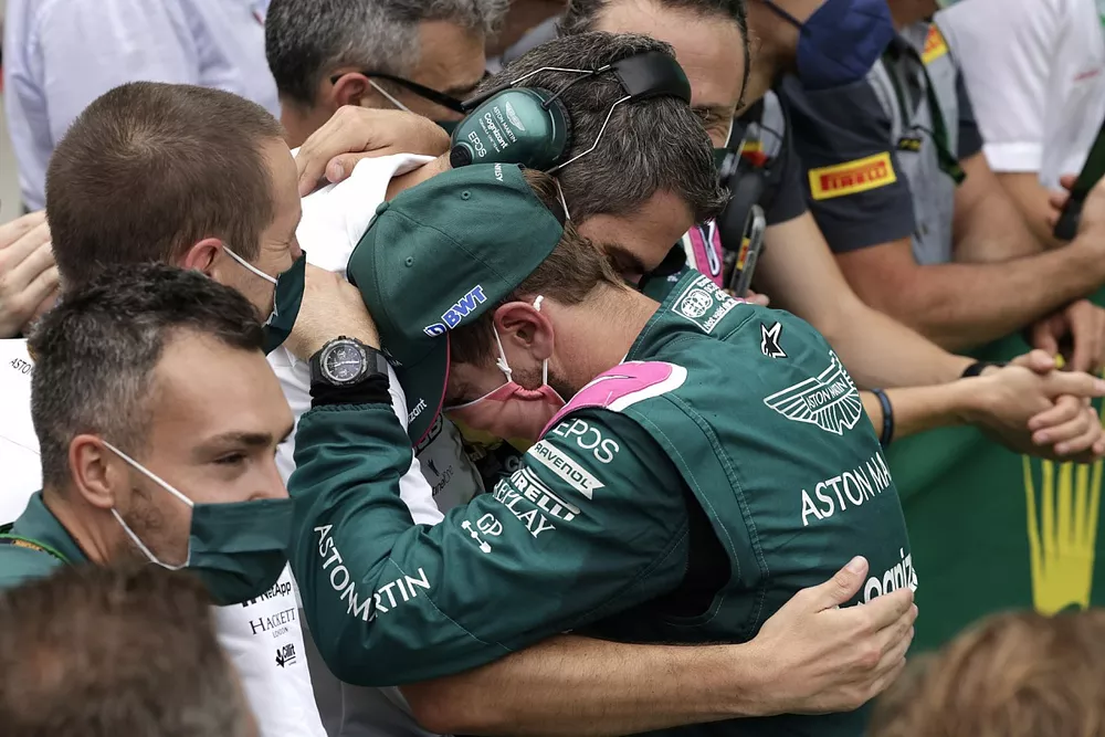 Sebastian Vettel, Aston Martin, 2nd position, celebrates with his team in Parc Ferme