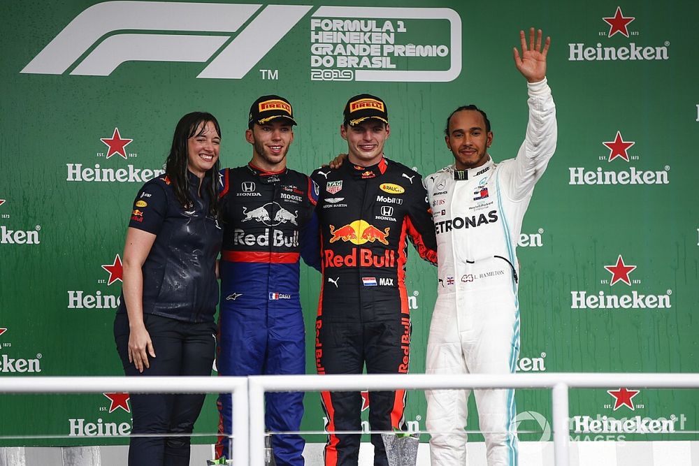 Podium: race winner Max Verstappen, Red Bull Racing, second place Pierre Gasly, Toro Rosso, third place Lewis Hamilton, Mercedes AMG F1, Hannah Schmitz, Red Bull Racing strategy engineer at Brazilian GP