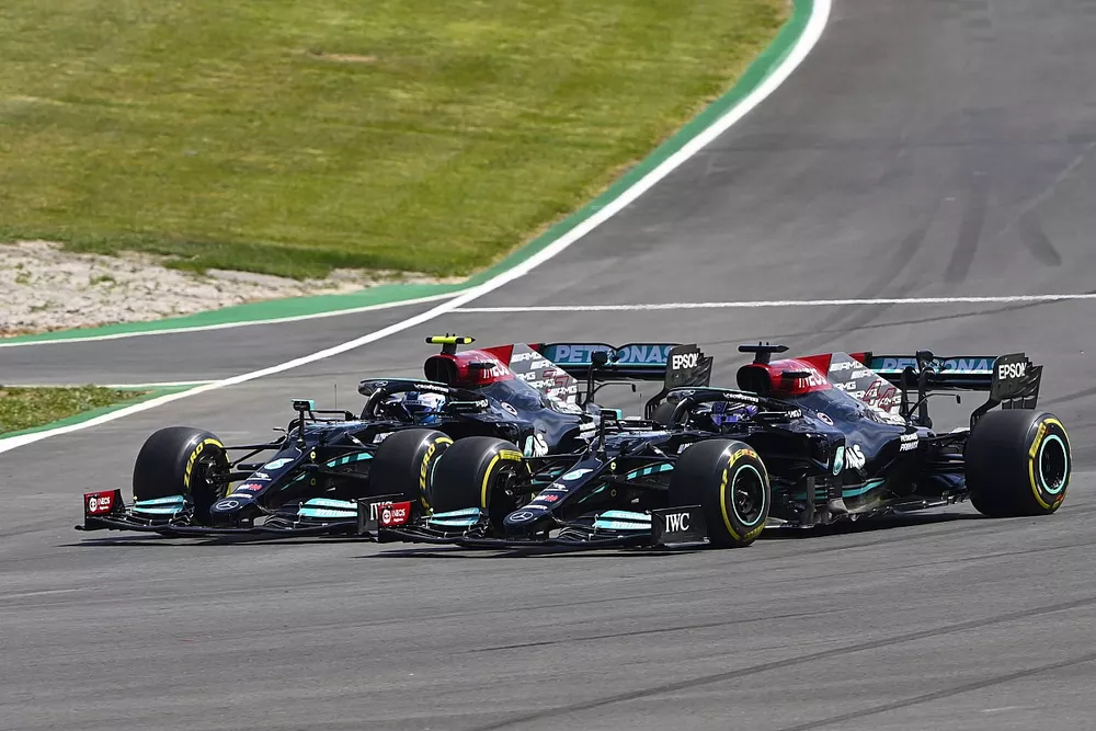 Lewis Hamilton, Mercedes W12, passes Valtteri Bottas, Mercedes W12