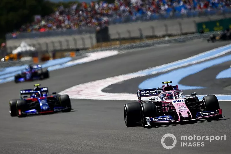 Lance Stroll, Racing Point RP19, leads Alexander Albon, Toro Rosso STR14