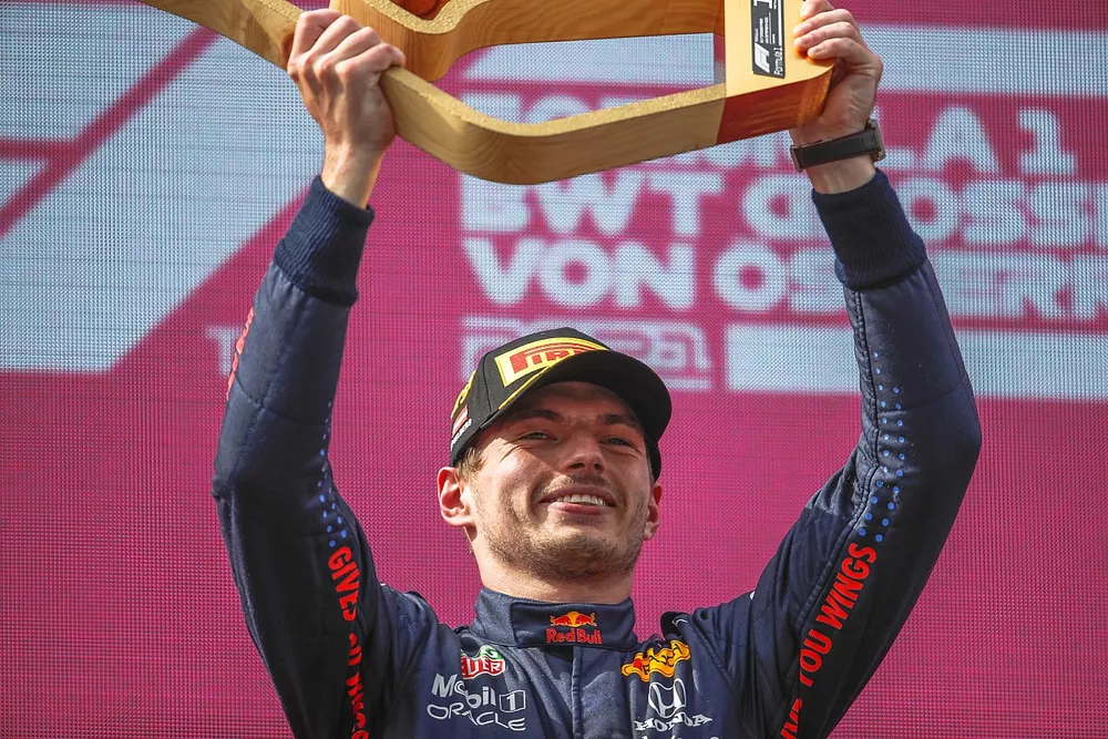 Max Verstappen, Red Bull Racing, 1st position, lifts his trophy