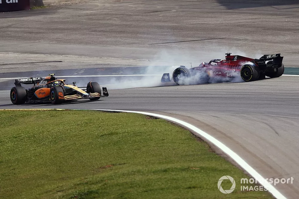 Lando Norris, McLaren MCL36, Charles Leclerc, Ferrari F1-75, collide, resulting in a spin