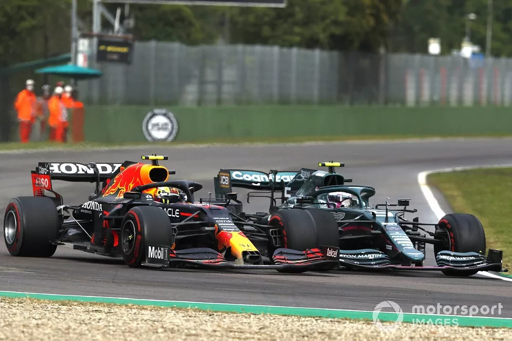 Sergio Perez, Red Bull Racing RB16B, battles with Sebastian Vettel, Aston Martin AMR21