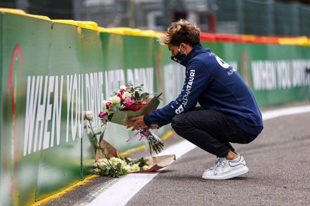 Pierre Gasly, AlphaTauri, lays flowers in memory of Anthoine Hubert, who passed away at this spot in 2019