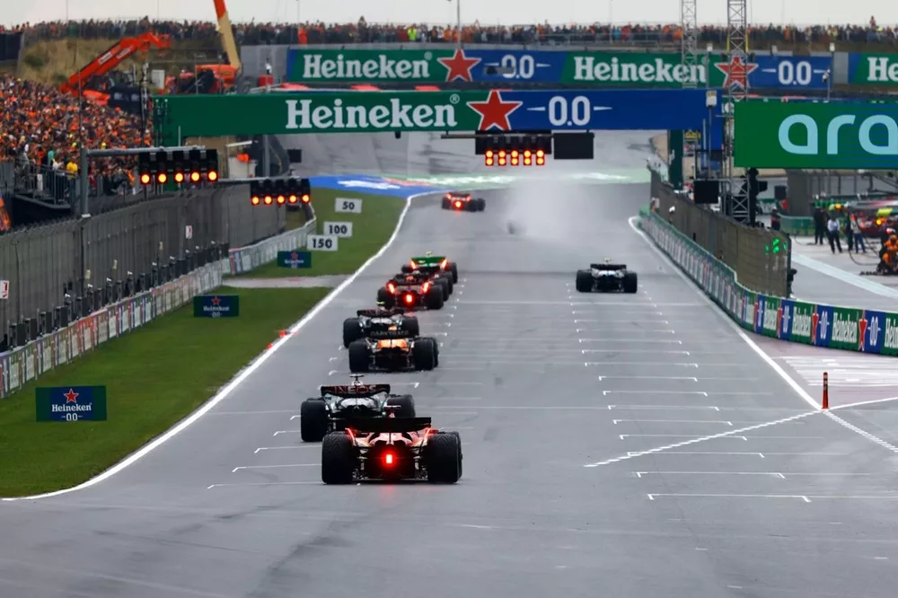 The drivers arrive on the grid for practice start procedures at the end of FP3