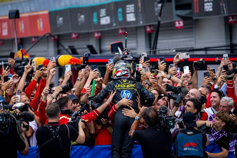 Charles Leclerc, Scuderia Ferrari, 1st position, celebrates with his team on arrival in Parc Ferme