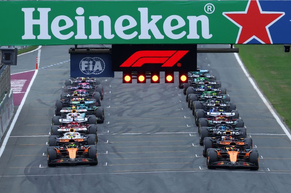 Cars line up on the grid for the race start.