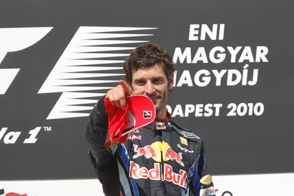 Mark Webber, Red Bull Racing RB6 Renault, 1st position, celebrates victory on the podium