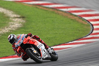 Lorenzo beats lap record to top Sepang test