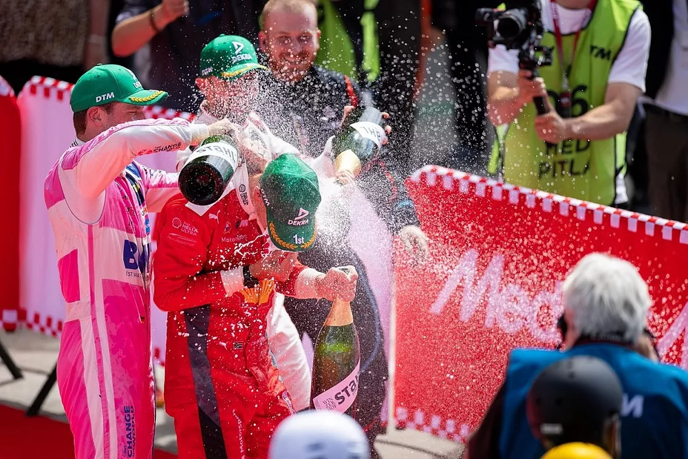  Champaign shower for championship leader Sheldon van der Linde