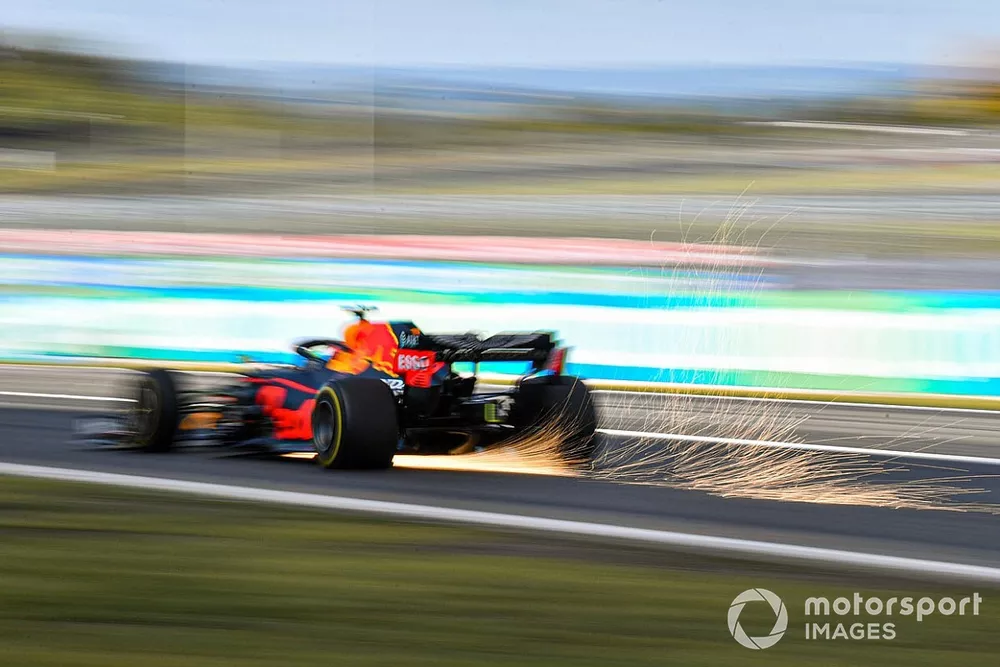 Alex Albon, Red Bull Racing RB16, kicks up some sparks