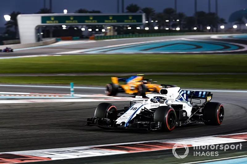 Lance Stroll, Williams FW41 en Stoffel Vandoorne, McLaren MCL33