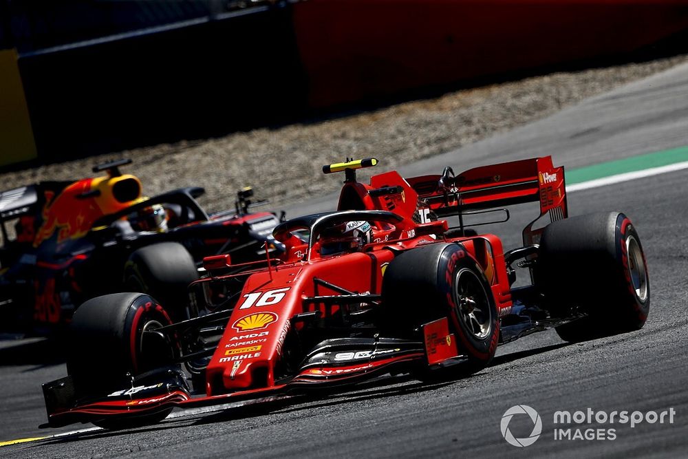 Charles Leclerc, Ferrari SF90, leads Max Verstappen, Red Bull Racing RB15