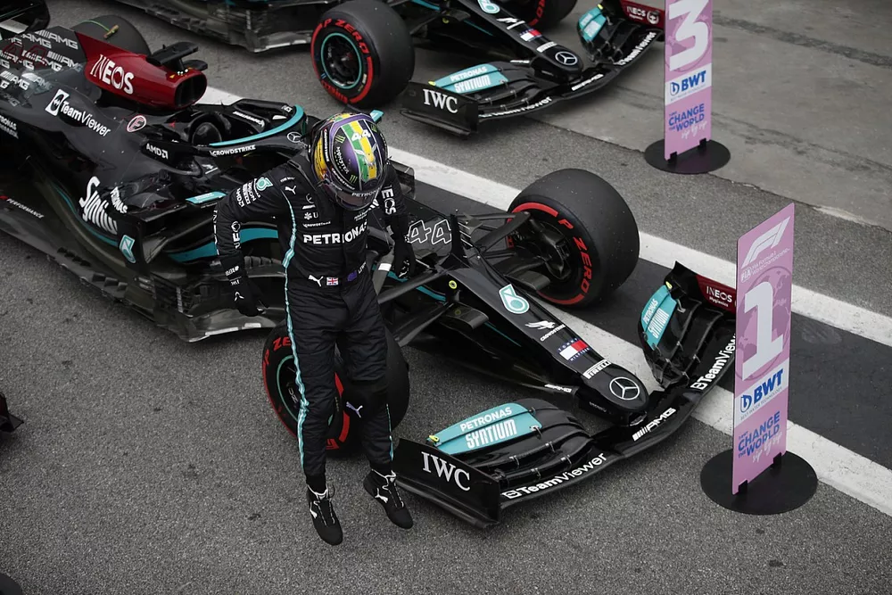 Pole man Lewis Hamilton, Mercedes, celebrates on arrival in Parc Ferme