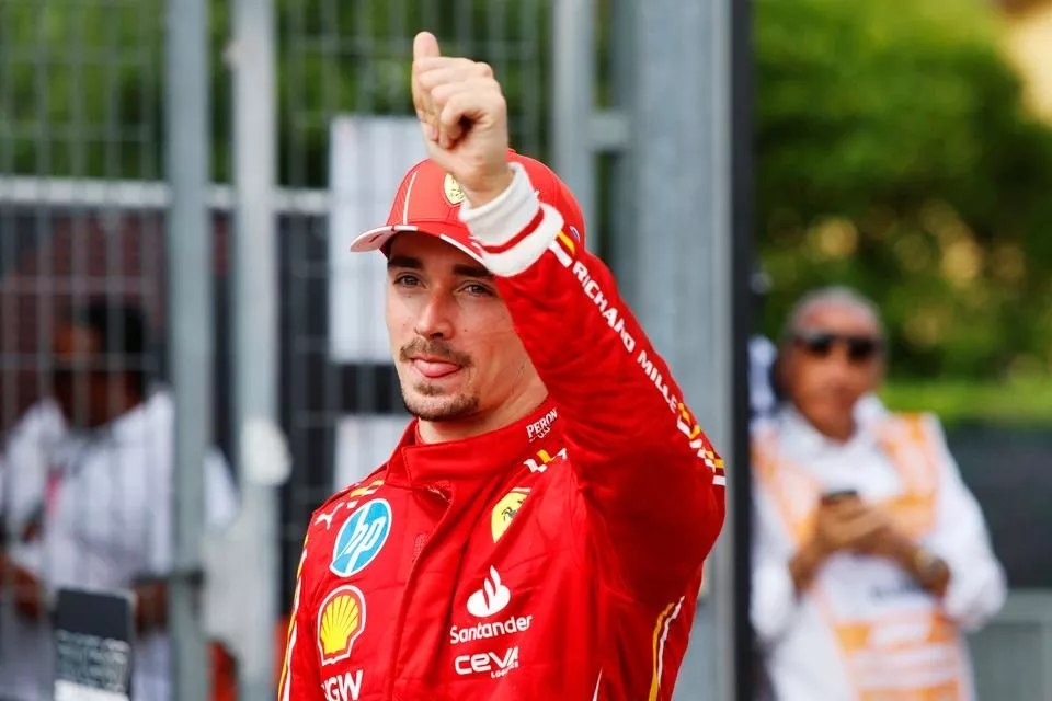 Charles Leclerc, Scuderia Ferrari, 3rd position, gives a thumbs up from Parc Ferme
