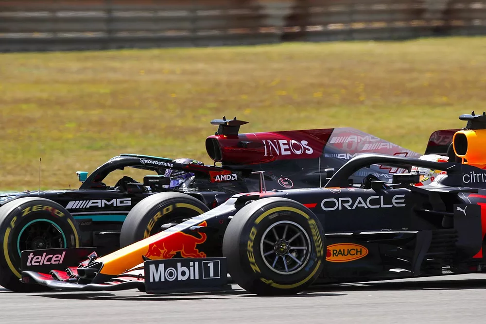 Lewis Hamilton, Mercedes W12, battles with Max Verstappen, Red Bull Racing RB16B