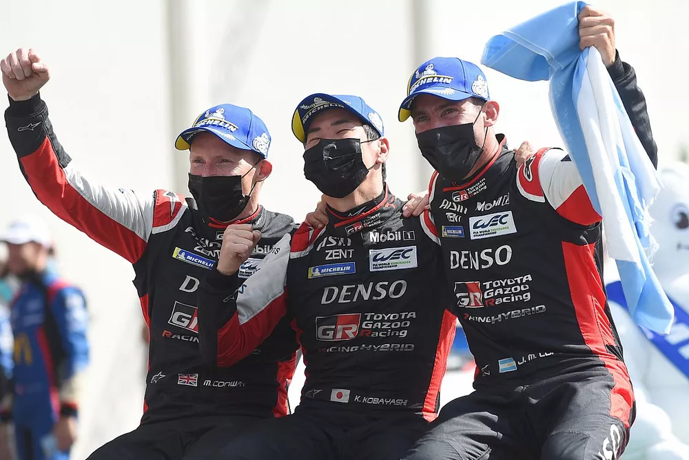 Winners Mike Conway, Kamui Kobayashi, Jose Maria Lopez, #7 Toyota Gazoo Racing Toyota GR010 - Hybrid Hypercar celebrate