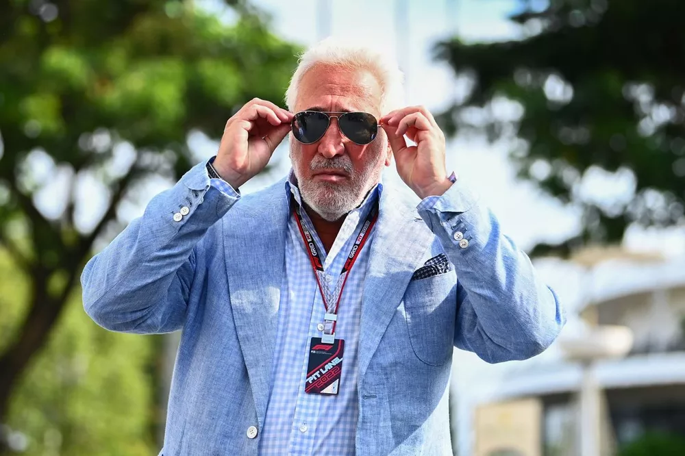 Lawrence Stroll, arrives at the track